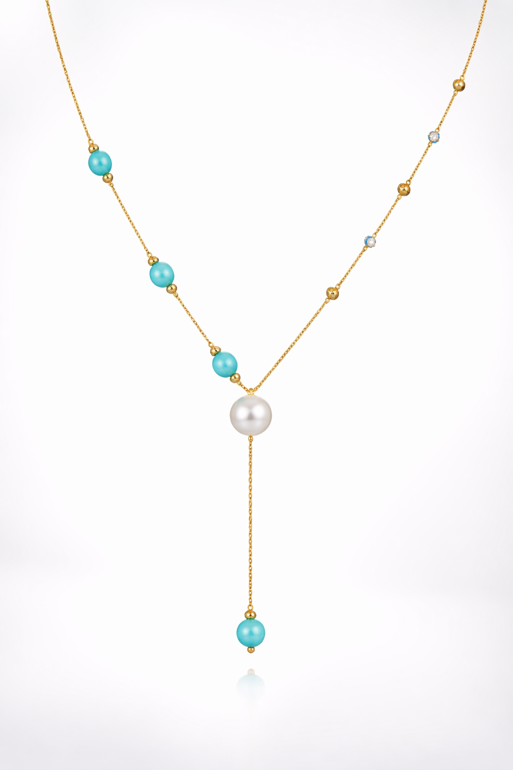 An elegant gold necklace designed with refined detailing and soft color accents.-Saleh Sallom
