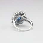 White Gold Diamond Halo Ring with Deep Blue Center Stone – IGI Certified-Saleh Sallom