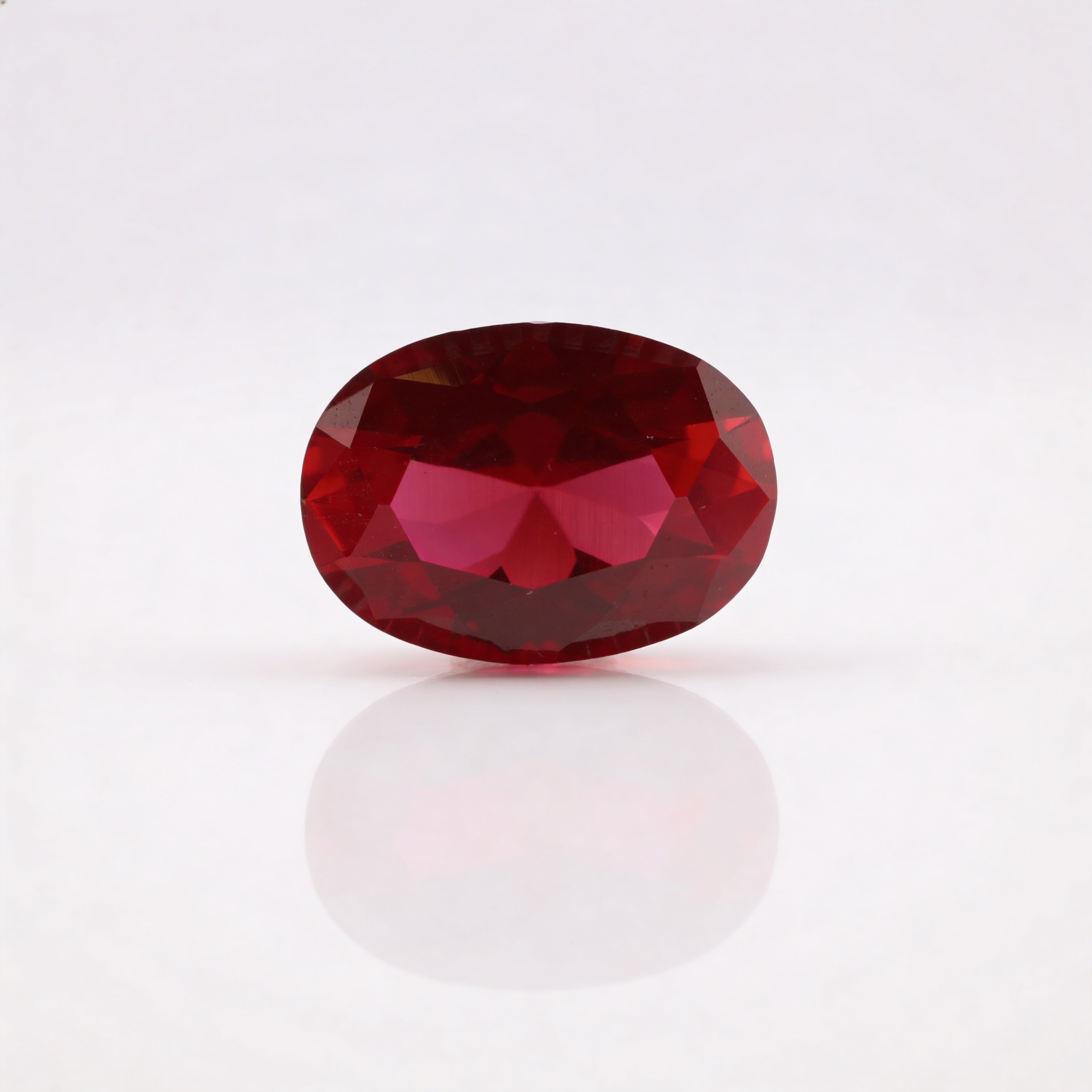 IGI Certified Laboratory Grown Ruby | 6.63 Carat Oval Brilliant Cut | Purplish Red Investment Gemstone Main image