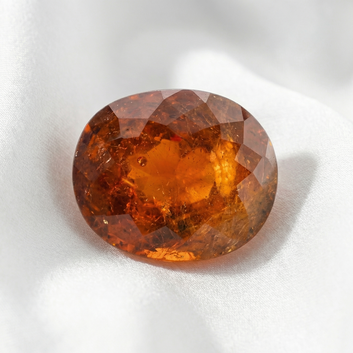 IGI Certified Natural Spessartite Garnet | 7.03 Carat Oval Cut | Brownish Orange-Saleh Sallom