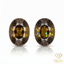 Matching Pair Natural Greenish Yellow Sphene Gemstones 2.46 Ct TW Oval Cut Adamantine Luster
