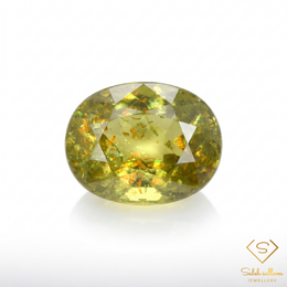 Natural Yellowish Green Sphene 1.22 Ct Oval Cut Adamantine Luster Titanite Gemstone