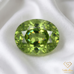Natural Yellowish Green Sphene 2.08 Ct Oval Cut Adamantine Luster Titanite Gemstone