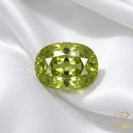Natural Yellowish Green Sphene 2.08 Ct Oval Cut Adamantine Luster Titanite Gemstone
