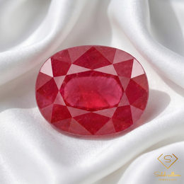 Natural Purplish Red Ruby | 17.38 Carat Oval Mixed Cut | Heated Glass-Filled Collector Gemstone