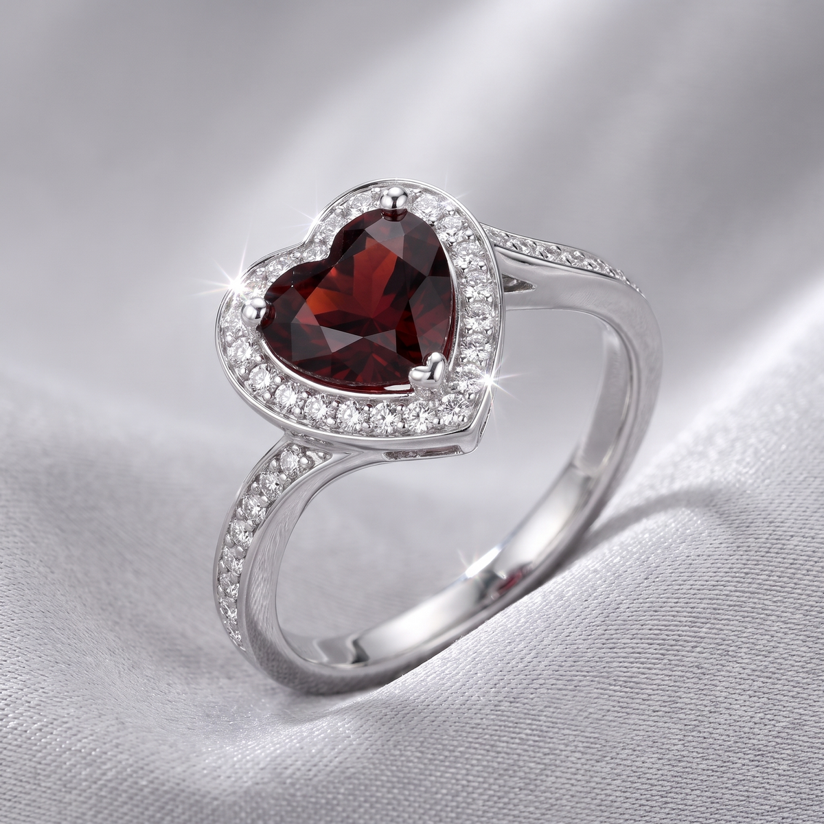 Heart-Shaped Red Stone Halo Ring with White Accent Stones in 925 Sterling Silver