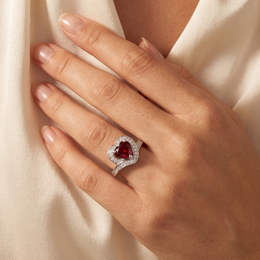 Heart-Shaped Red Stone Halo Ring with White Accent Stones in 925 Sterling Silver