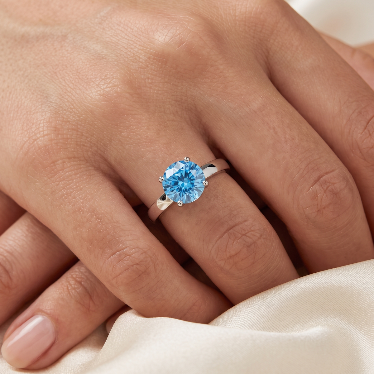 Blue Round-Cut Solitaire Statement Ring in 925 Silver