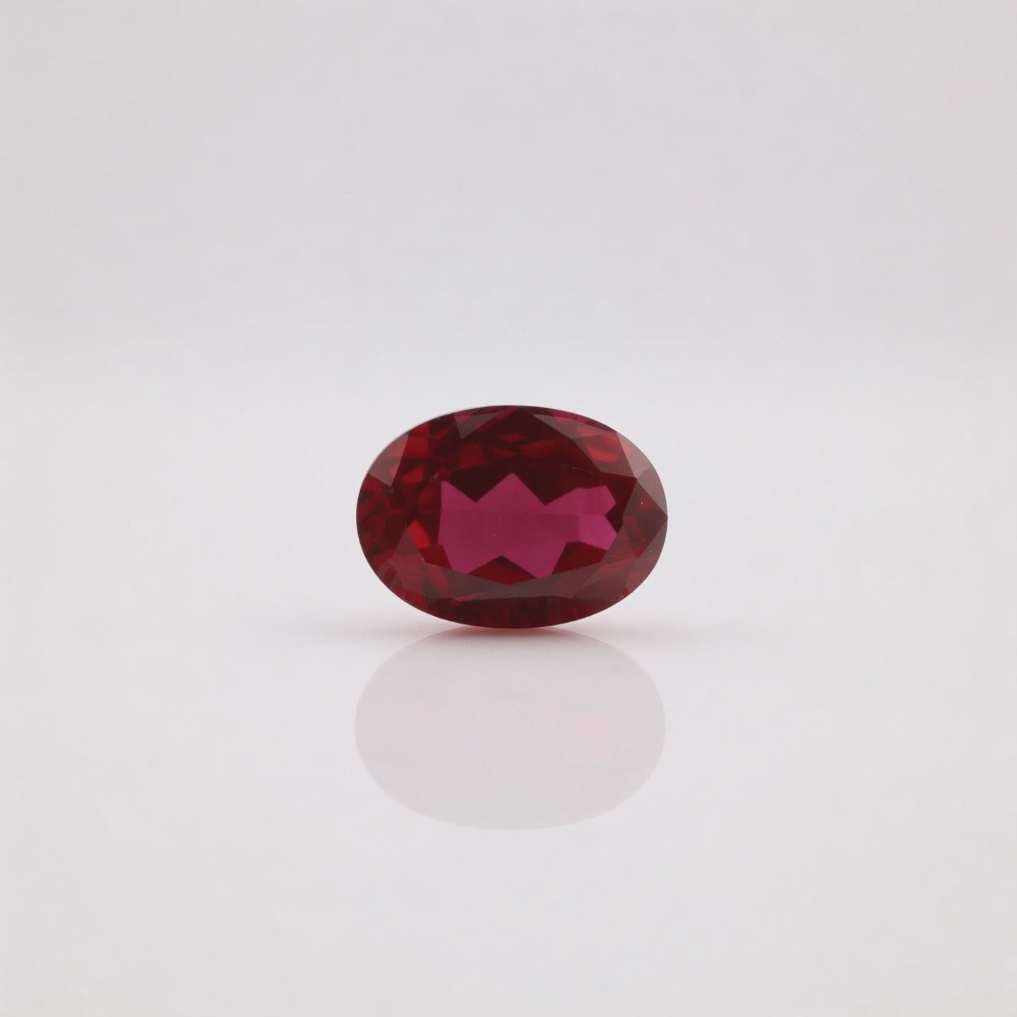 IGI Certified Laboratory Grown Ruby | 6.63 Carat Oval Brilliant Cut | Purplish Red Investment Gemstone