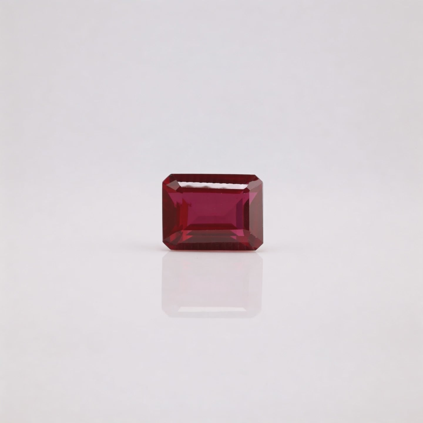 IGI Certified Laboratory Grown Ruby | 16.15 Carat Emerald Cut | Purplish Re